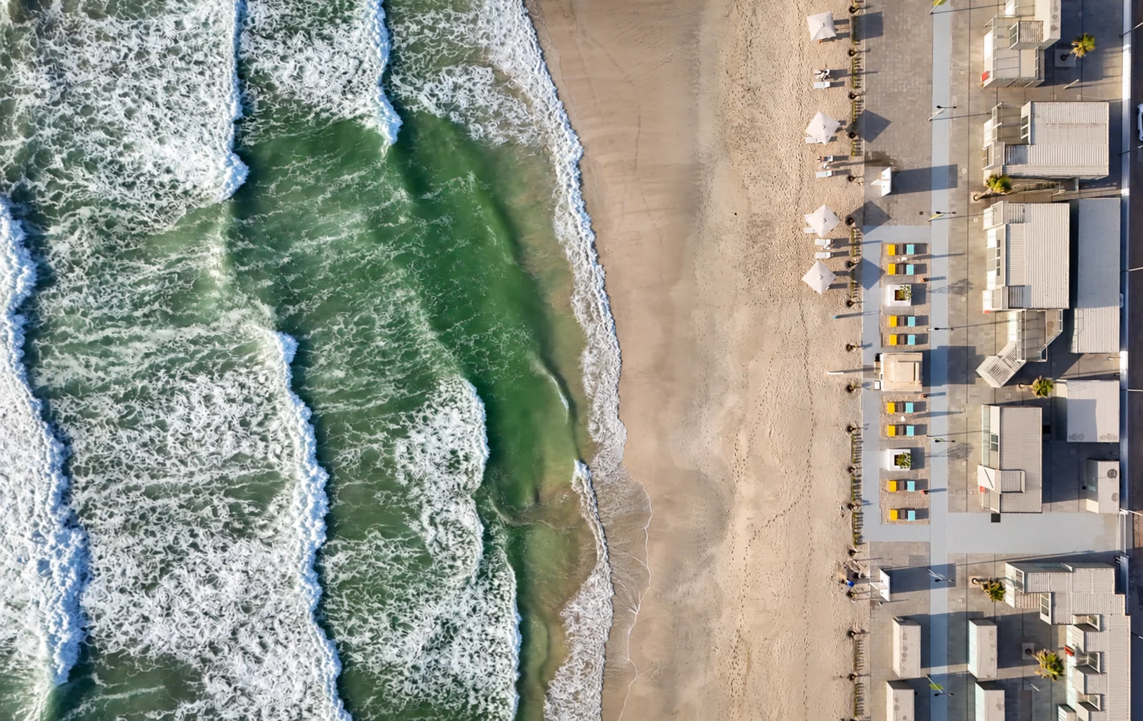 An overhead view of the shore and beachfront spaces at Al Bahr.